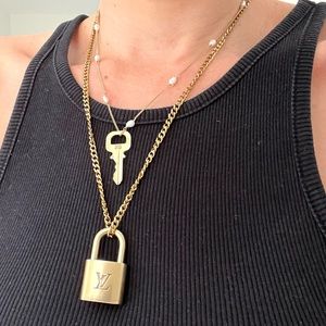 Authentic vintage Louis Vuitton brass lock & key